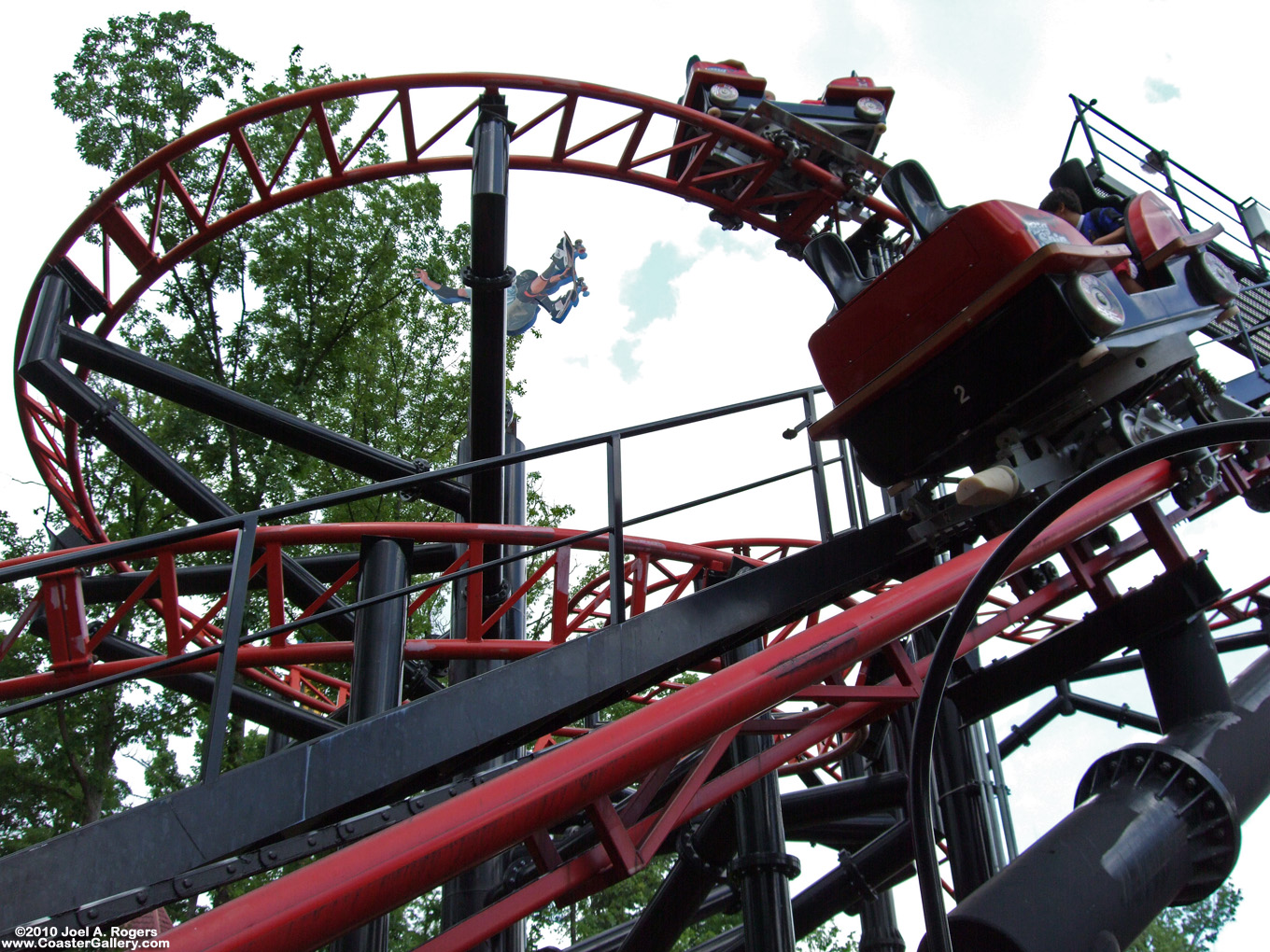 Two spinning cars on the Tony Hawk Big Spin roller coaster at Six Flags