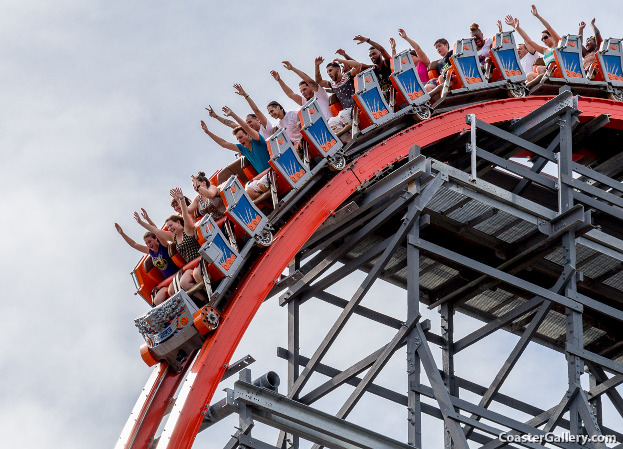 Riding a roller coaster with your hands in the air, like you just don't care