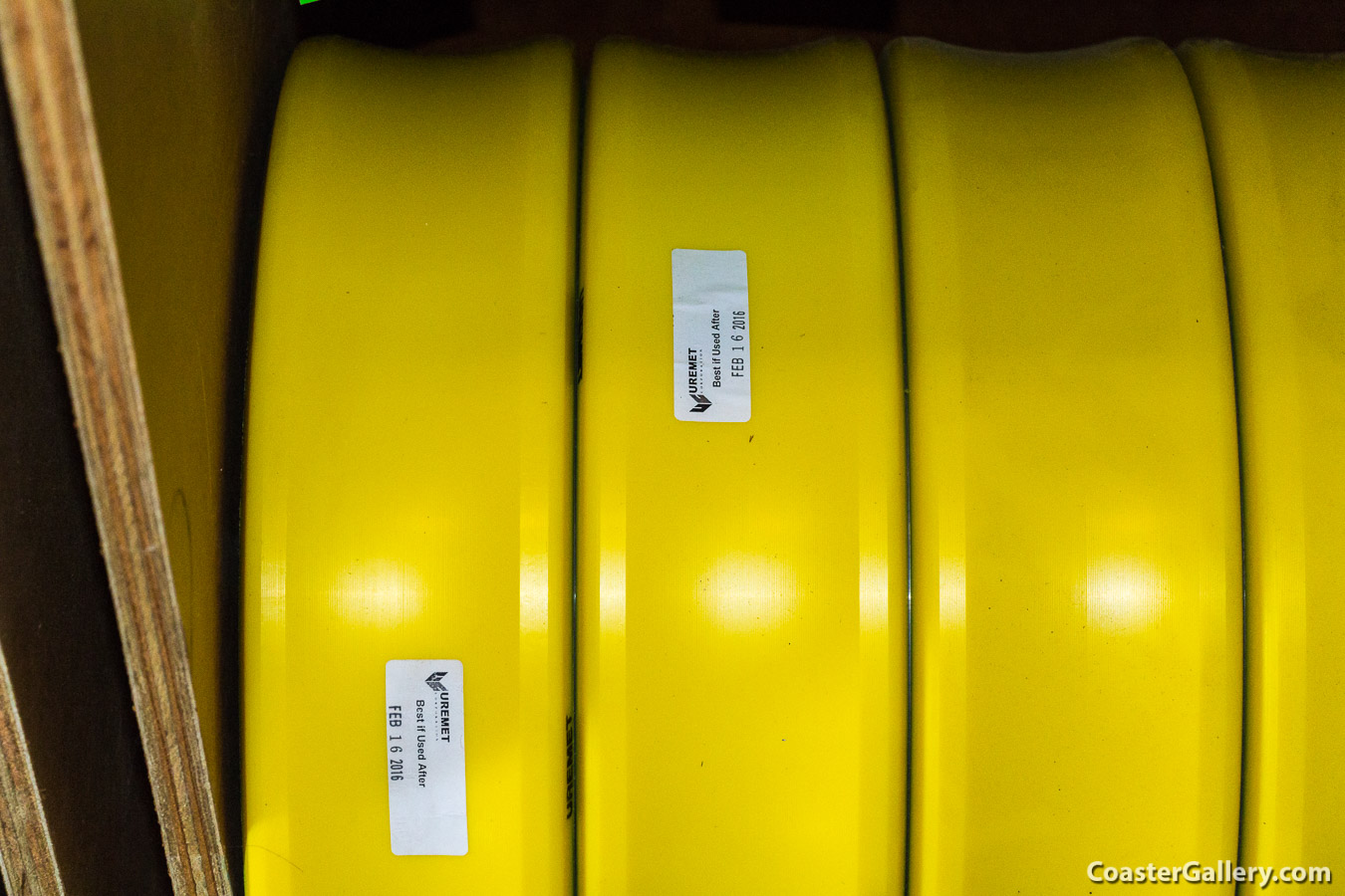 Polyurethane and nylon covered wheels on a roller coaster