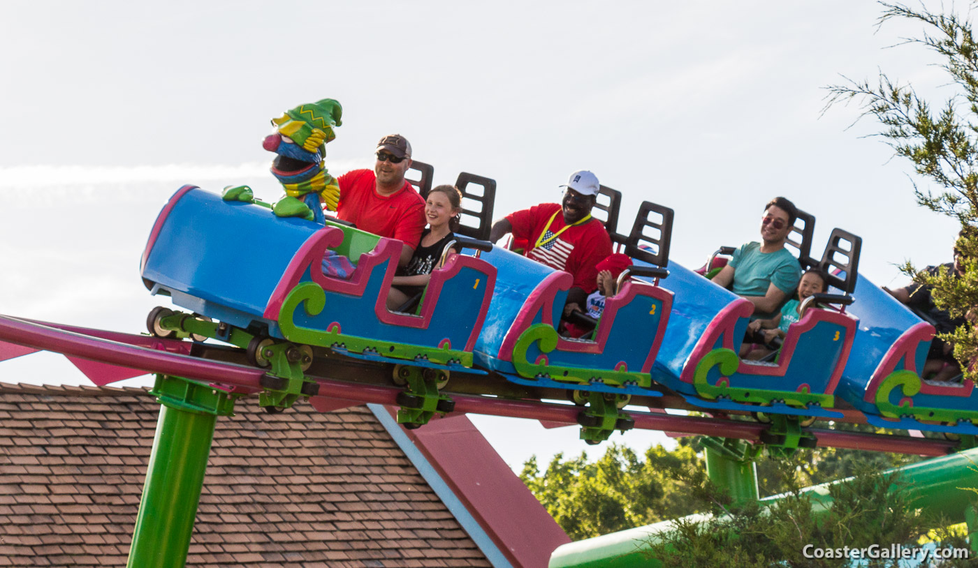 Magnetic breaking system and a statue of the Grover Muppet sitting on Grover's Alpine Express roller coaster