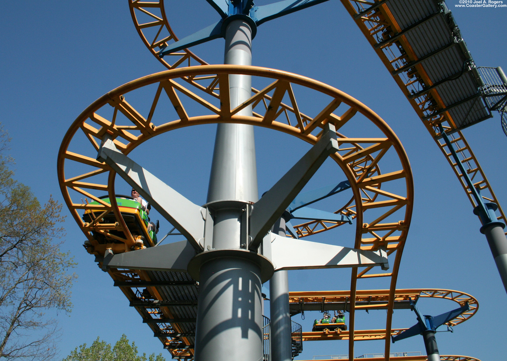 Sitting under steel roller coaster track