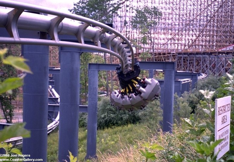Top Gun (now Flight Deck and The Bat) roller coaster passing by the old Son of Beast coaster