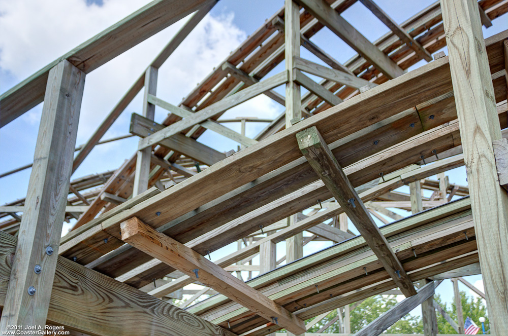 Close up details of a wooden roller coaster's structure