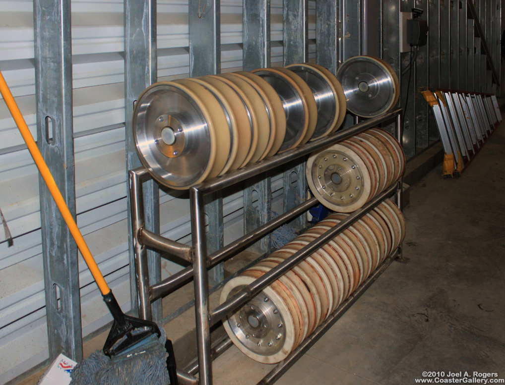 Spare wheels sitting in a roller coaster station