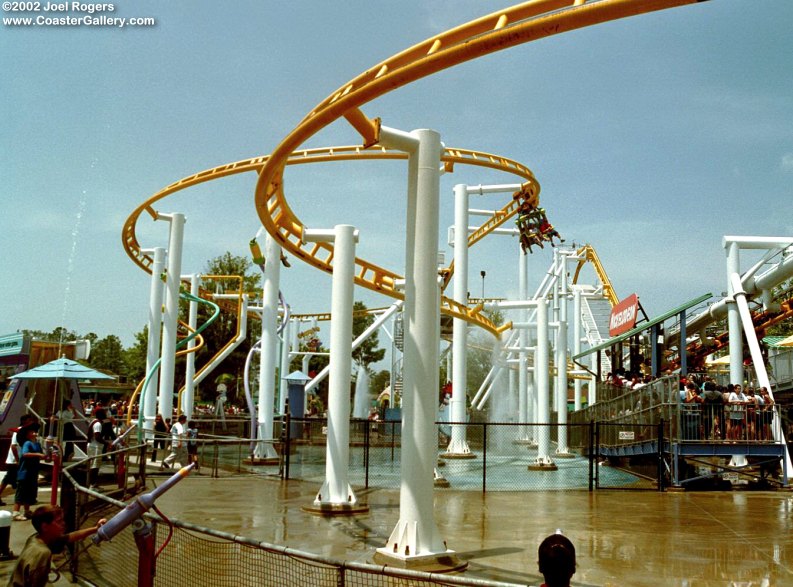 Water cannons hitting a roller coaster