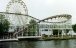 Coaster on a boardwalk by the water