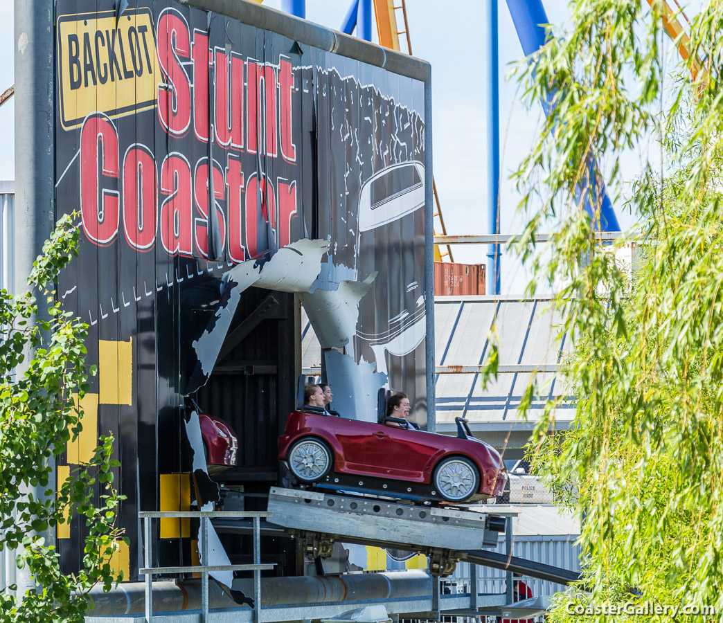 Pictures of MINI Cooper cars on a roller coaster