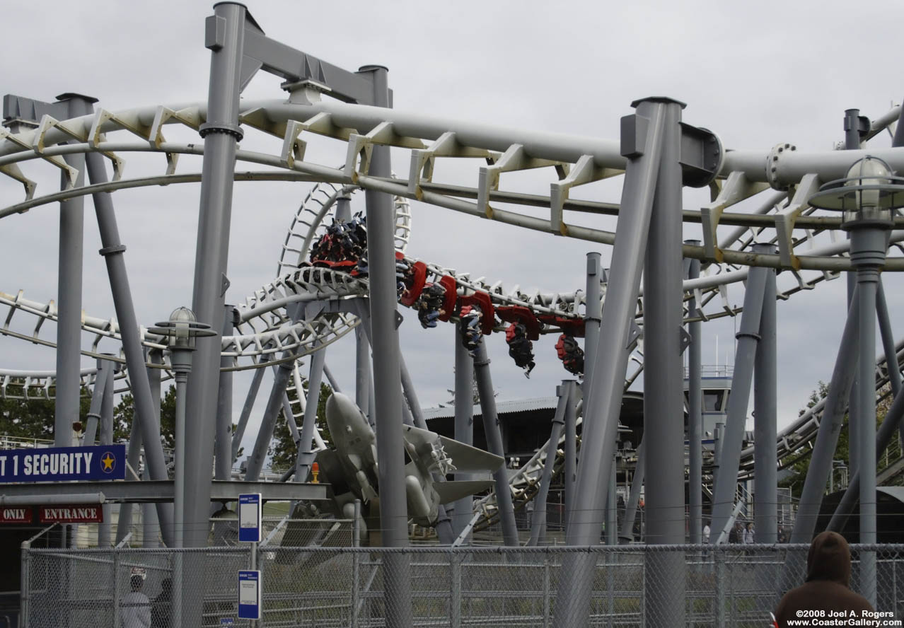 Trains on a suspended looping coaster