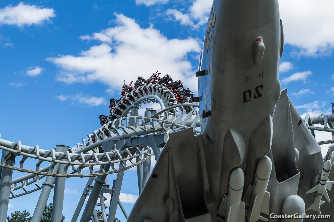 Pictures of an F-14 and the Flight Deck Roller Coaster. Also a discussion of the history of the Grumman F-14 Tomcat.