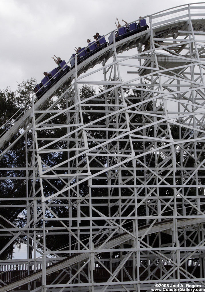 Roller coaster car with three rows.