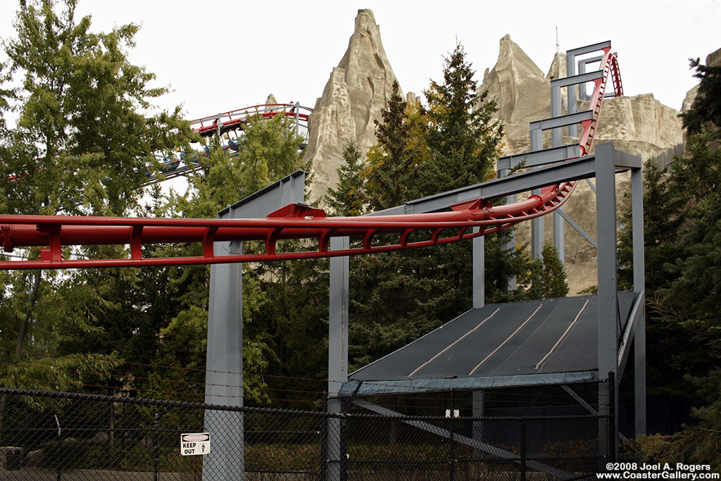 Vortex - Suspended roller coaster going over a mountain in Canada