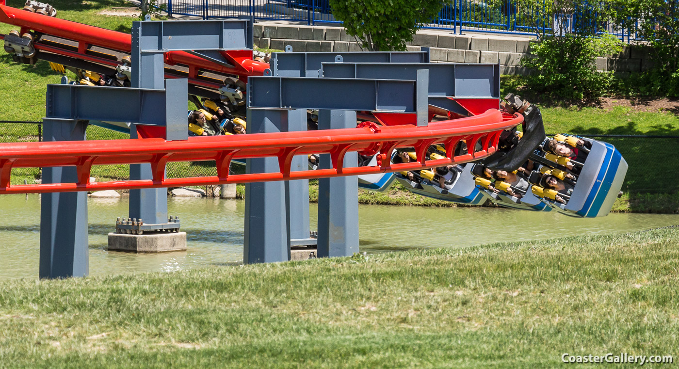 Details of a roller coaster train and safety restraint systems