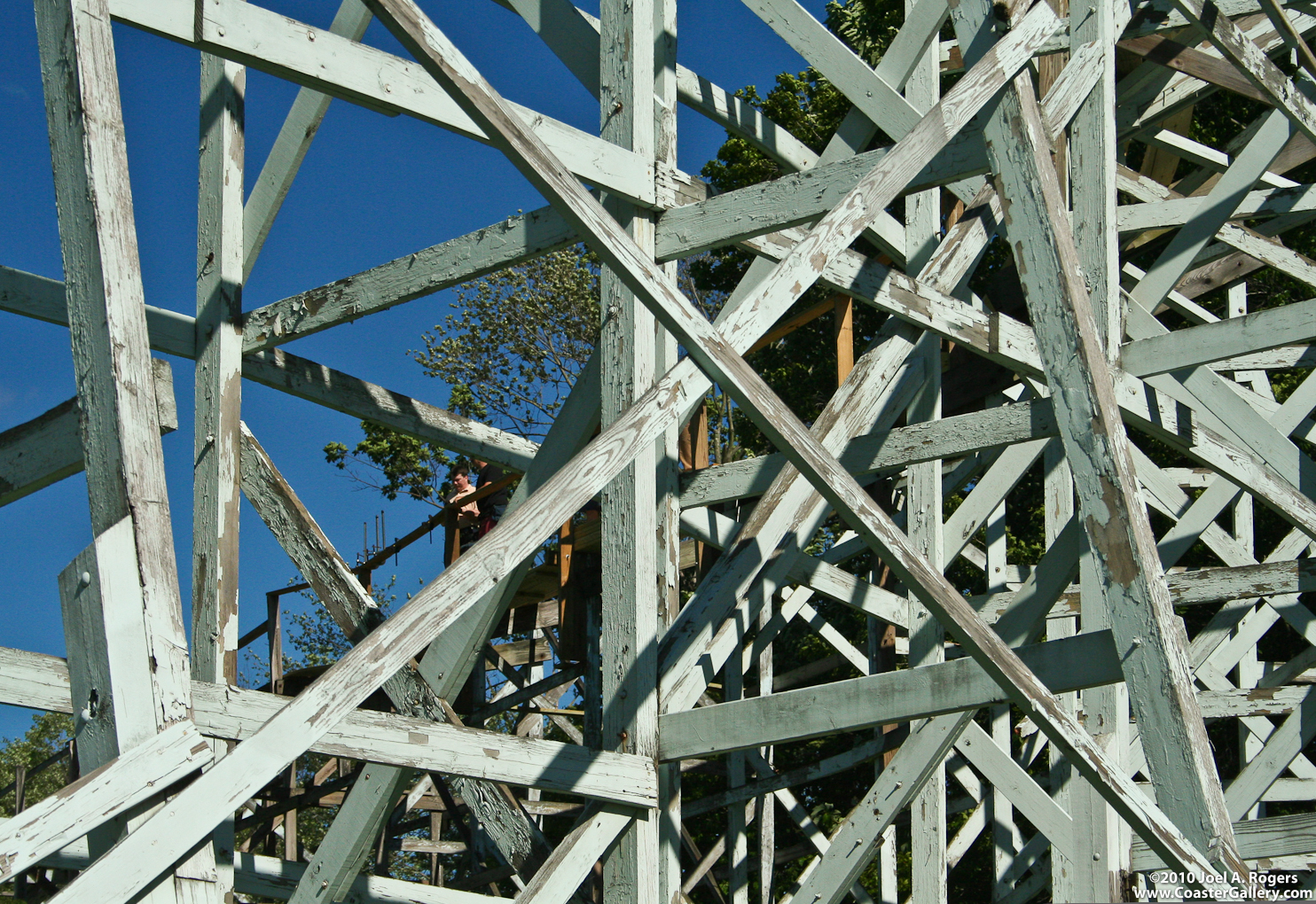 Working on a wooden roller coaster