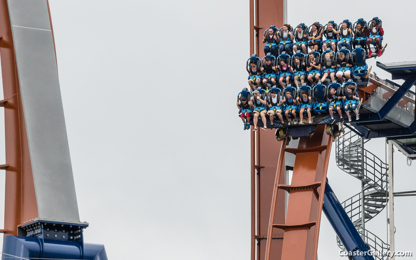 Mid-course brakes on a steel diving roller coaster