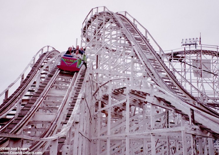 Skyliner roller coaster cresting the hill