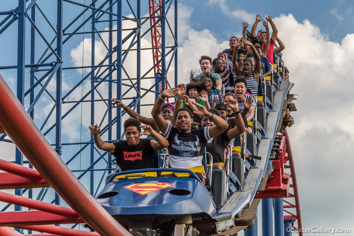 Pictures of people screaming on a roller coaster