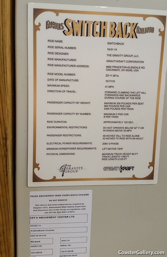 Roller coaster inspection sticker. Amusement park safety and liability discussion.
